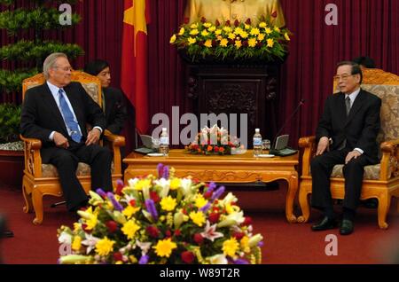 Secretary of Defense Donald H. Rumsfeld and Vietnamese Prime Minister Phan Van Khai sit down to discuss regional defense issues in Hanoi, Vietnam, on June 5, 2006.  Rumsfeld is in Hanoi to meet with Vietnamese leaders and to visit a U.S. team investigating the whereabouts of the nearly 2,000 American servicemembers still unaccounted for from the Vietnam War. Stock Photo
