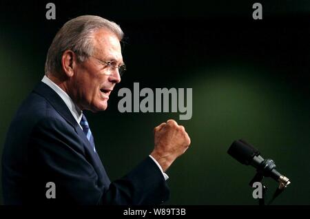 Secretary of Defense Donald H. Rumsfeld addresses Pentagon civilian employees and service members during a town hall meeting on May 19, 2006. Rumsfeld and Chairman of the Joint Chiefs of Staff Gen. Peter Pace, U.S. Marine Corps, answered questions and thanked the audience for their hard work and devotion. Stock Photo