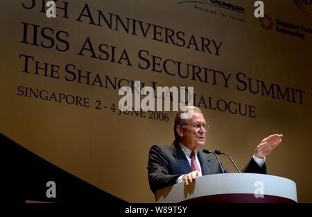Secretary of Defense Donald H. Rumsfeld addresses the audience at the fifth annual International Institute for Strategic Studies Asia Security Conference in Singapore, on June 2, 2006.  Rumsfeld is in Singapore to meet with regional allies and attend the conference known as the Shangri-La Dialogue. Stock Photo