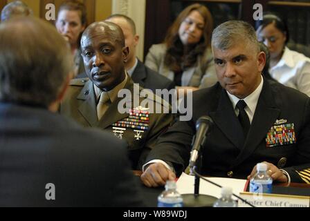 Master Chief Petty Officer of the Navy Joe R. Campa Jr., (right) and Sgt. Major of the Marine Corps Carlton Kent (left) listen intently to a question as they testify before the House Appropriations Subcommittee on Military Construction in Washington, D.C., on Feb. 7, 2008.  Campa, Kent, Sgt. Major of the Army Kenneth Preston and Chief Master Sgt. of the Air Force Rodney McKinley testified on health care, family housing and childcare.  Diana Campa, wife of Master Chief Campa and the U.S. Navy's ombudsman-at-large, joined the senior enlisted leaders in testimony.