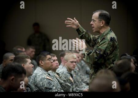 Chairman of the Joint Chiefs of Staff Adm. Mike Mullen, U.S. Navy, answers questions during an all-hands call with soldiers assigned to Fort Hood, Texas, on April 16, 2009.  Mullen is on a four-day tour of installations visiting service members in the Lone Star state. Stock Photo