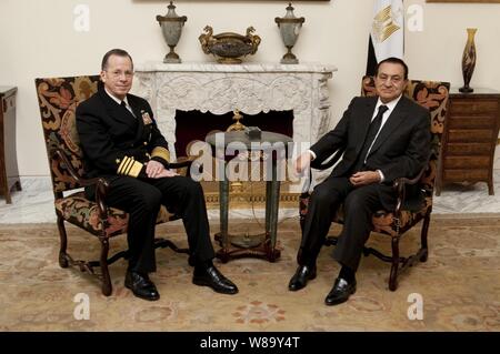 Chairman of the Joint Chiefs of Staff Adm. Mike Mullen, U.S. Navy, meets with Egyptian President Hosni Mubarak in Cairo on Feb. 14, 2010.  Mullen is on a weeklong tour of the region visiting with key partners and allies. Stock Photo