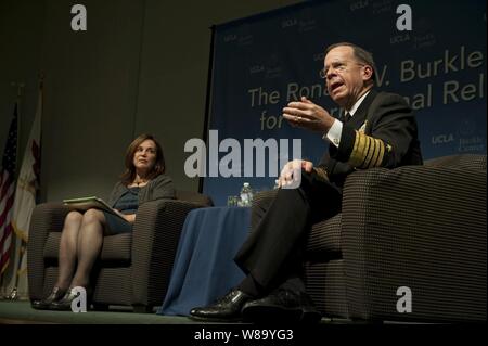 Chairman of the Joint Chiefs of Staff Adm. Mike Mullen, U.S. Navy, answers an audience member?s question during the Bernard Brodie Distinguished Lecture Series at the University of California at Los Angeles on Nov. 10, 2010.  Mullen was interviewed by National Public Radio?s Morning Edition co-host Renee Montagne (left) at the lecture that provides a special forum for dignitaries and scholars of politics, strategy, warfare and peace to present their views to the UCLA community and the public. Stock Photo