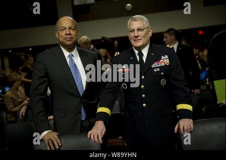 Department of Defense General Counsel Jeh C. Johnson (left) and Commander, U.S. Army Europe Gen. Carter Ham appear before the Senate Armed Services Committee on Dec. 2, 2010.  Johnson and Ham will testify with Secretary of Defense Robert M. Gates and Chairman of the Joint Chiefs of Staff Adm. Mike Mullen regarding the findings of the 'Don't Ask, Don't Tell' Comprehensive Working Group report. Stock Photo