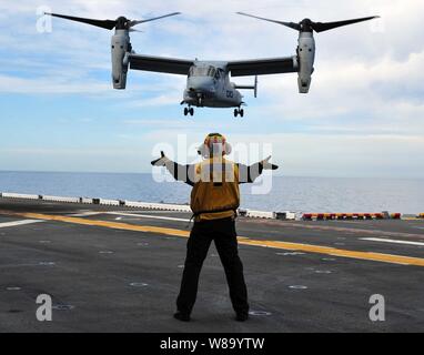 An MV-22 Osprey tiltrotor aircraft attached to Marine Medium Tiltrotor Squadron 166 approaches the flight deck of the amphibious assault ship USS Makin Island (LHD 8) in the Pacific Ocean on March 1, 2011.