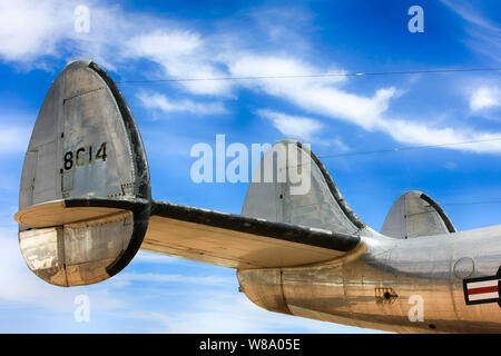 Triple rudder assembly's famous recognizable part of a Lockheed L1049 ...