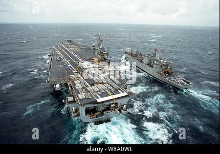 (December 20, 1995).... The U.S. Navy's aircraft carrier USS Theodore Roosevelt (CVN 71) conducts a weapons on-load with the ammunition ship USS Santa Barbara (AE 28) in the waters off the Virginia-Carolina  coast, following her post deployment yard period, at the Norfolk Naval Shipyard, in Portsmouth, Virginia.  Official U.S. Navy Stock Photo