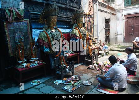 Lalitpur, Nepal. 08th Aug, 2019. Buddhist devotees offer prayers in front of idols of Buddha during Pancha Dan festival in Lalitpur, Nepal. (Photo by Archana Shrestha/Pacific Press) Credit: Pacific Press Agency/Alamy Live News Stock Photo