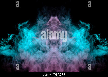 Abstract pattern of green and pink smoke with flames on a black background Stock Photo