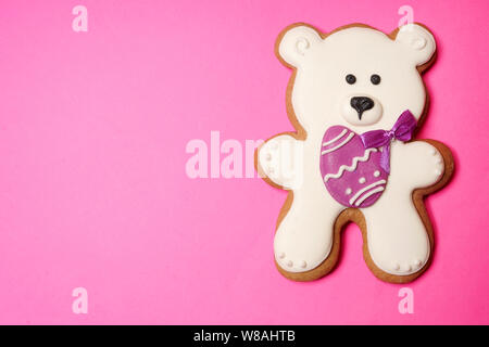 White Easter bear on pink background Stock Photo