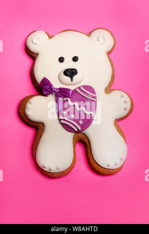 White Easter bear on pink background Stock Photo