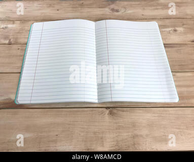 Open notebook on wood board. Photo Stock Photo