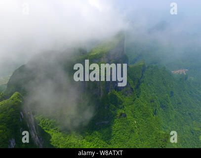 Landscape of the sea of clouds after rainfall in Tianmen Mountain (or Tianmenshan Mountain) in Zhangjiajie National Forest Park in Zhangjiajie city, c Stock Photo