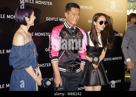 (From left) Hong Kong singer and actress Miriam Yeung, actor Louis Koo and South Korean actress Cheon Seong-im, better known by her stage name Song Ji Stock Photo