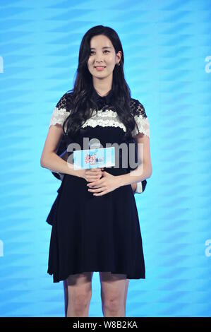 Singer and actress Seo Ju-hyun, known professionally as Seohyun, of South Korean girl group Girls' Generation, poses at the press conference for the p Stock Photo