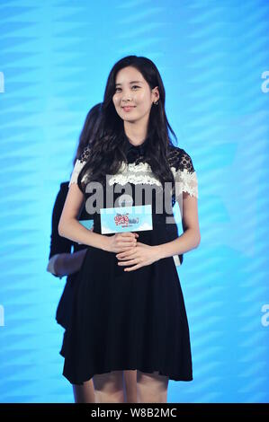 Singer and actress Seo Ju-hyun, known professionally as Seohyun, of South Korean girl group Girls' Generation, poses at the press conference for the p Stock Photo