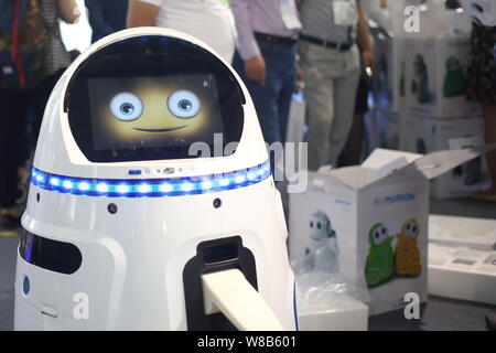 An interactive robot is on display during the 19th China Beijing International High-tech Expo (CHITEC) in Beijing, China, 19 May 2016.   The 19th Chin Stock Photo