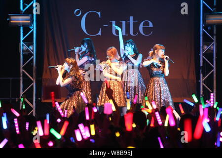 Members of Japanese idol girl group C-ute, also known as Cute, perform at their concert in Hong Kong, China, 21 May 2016. Stock Photo