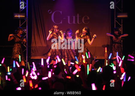 Members of Japanese idol girl group C-ute, also known as Cute, perform at their concert in Hong Kong, China, 21 May 2016. Stock Photo