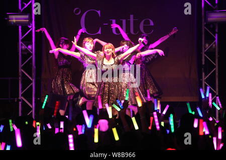 Members of Japanese idol girl group C-ute, also known as Cute, perform at their concert in Hong Kong, China, 21 May 2016. Stock Photo