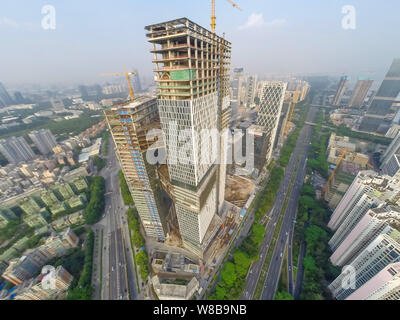 The Tencent Haibin Building, the new global headquarters of Tencent, is under construction in Shenzhen city, south China's Guangdong province, 27 Octo Stock Photo