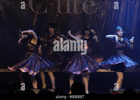 Members of Japanese idol girl group C-ute, also known as Cute, perform at their concert in Hong Kong, China, 21 May 2016. Stock Photo