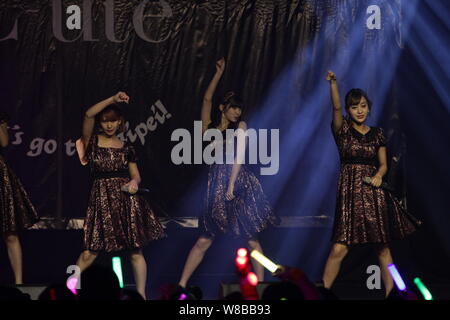 Members of Japanese idol girl group C-ute, also known as Cute, perform at their concert in Hong Kong, China, 21 May 2016. Stock Photo