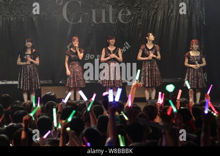 Members of Japanese idol girl group C-ute, also known as Cute, perform at their concert in Hong Kong, China, 21 May 2016. Stock Photo