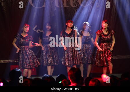 Members of Japanese idol girl group C-ute, also known as Cute, perform at their concert in Hong Kong, China, 21 May 2016. Stock Photo