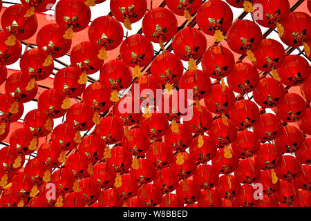 Red Chinese hanging lanterns in Buddhist temple in Chinatown, Singapore Stock Photo