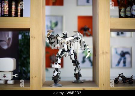 A robot is on display at the robot-themed cafe Airobot Coffee in Shanghai, China, 31 May 2016.   Artificial intelligence is making its way into every Stock Photo