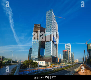 The Tencent Haibin Building, the new global headquarters of Tencent, is under construction in Shenzhen city, south China's Guangdong province, 2 March Stock Photo