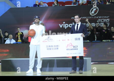Former NBA star Allen Iverson tries to breakthrough during a friendly match  between American basketball celebrity team and Beijing Ducks in Cixi, east  Stock Photo - Alamy