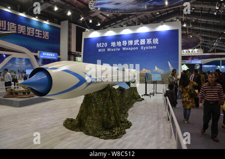 Visitors look at a Chinesemade CX1 supersonic antiship cruise