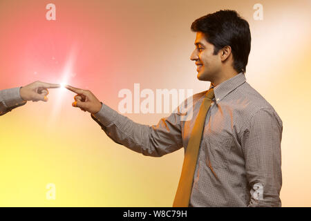 Businessman using futuristic touch screen Stock Photo