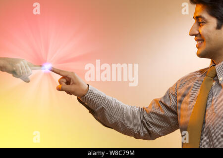 Businessman using futuristic touch screen Stock Photo