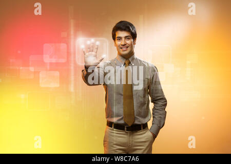 Businessman using a touch screen for biometrics identification Stock Photo