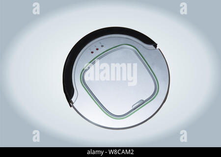 Robotic vacuum cleaner isolated on silver background Stock Photo
