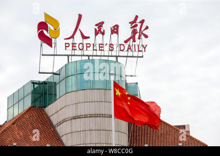 --FILE--A Chinese national flag flutters at the Beidaihe Sanatorium of the People's Daily in Qinhuangdao city, north China's Hebei province, 29 August Stock Photo