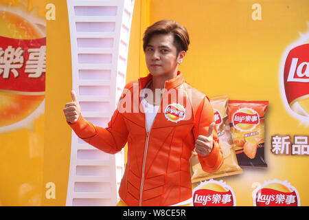Taiwanese singer Show Lo poses at a promotional event for Lay's chips of PepsiCo in Taipei, Taiwan, 30 April 2015. Stock Photo