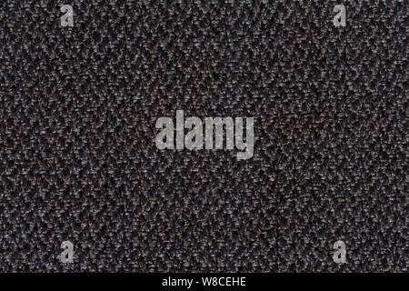 Black textile background with relief surface on macro. Stock Photo
