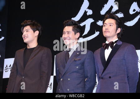 (From left) South Korean actors Kang Ha-neul, Shin Ha-kyun and Jang Hyuk pose during a press conference for their new movie 'Empire of Lust' in Seoul, Stock Photo