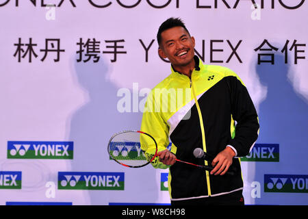 Chinese badminton player Lin Dan smiles during the Lin Dan & YONEX Cooperation Announcement in Beijing, China, 7 January 2015. Stock Photo