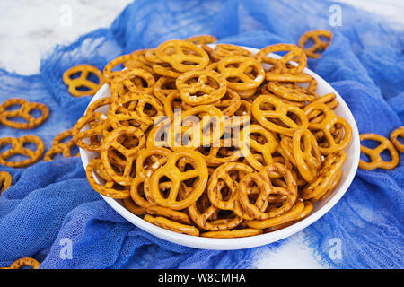 Salted pretzel on white background Stock Photo