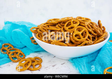 Salted pretzel on white background Stock Photo