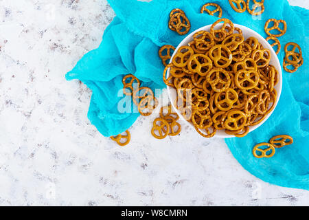 Salted pretzel on white background Stock Photo