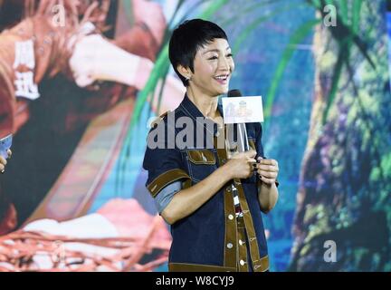 Chinese actress Zhou Xun speaks at a press conference for the film 'On the way' in Hangzhou, east China's Zhejiang province, 10 December 2015. Stock Photo