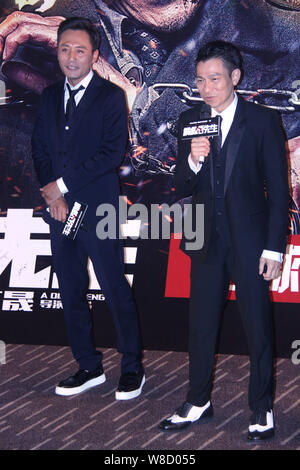 Hong Kong actor Andy Lau, right, and Chinese actor Liu Ye attend the premiere for their new movie 'Saving Mr. Wu' in Beijing, China, 21 September 2015 Stock Photo