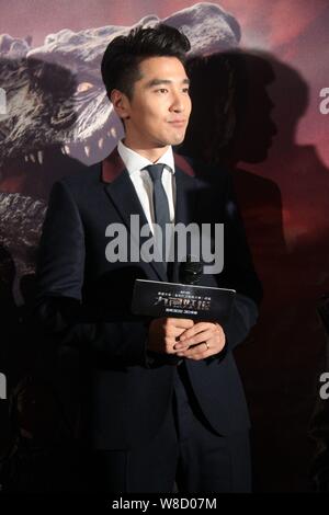 Taiwanese actor Mark Zhao poses on the red carpet for the premiere of his movie 'Chronicles of the Ghostly Tribe' in Beijing, China, 24 September 2015 Stock Photo