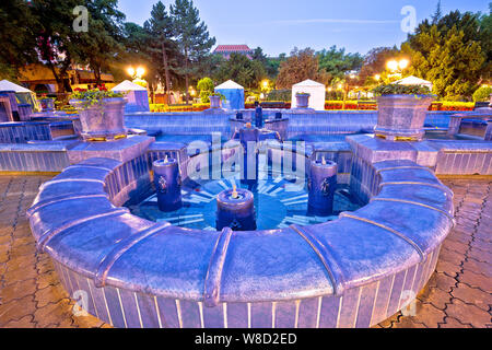 Subotica city fountain square evening view, Vojvodina region of Serbia Stock Photo